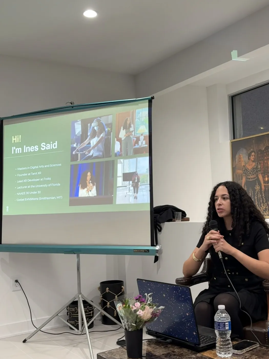 Ines Said ouvre la soirée at the Ambassade de Tunisie, with her introduction slide on the screen